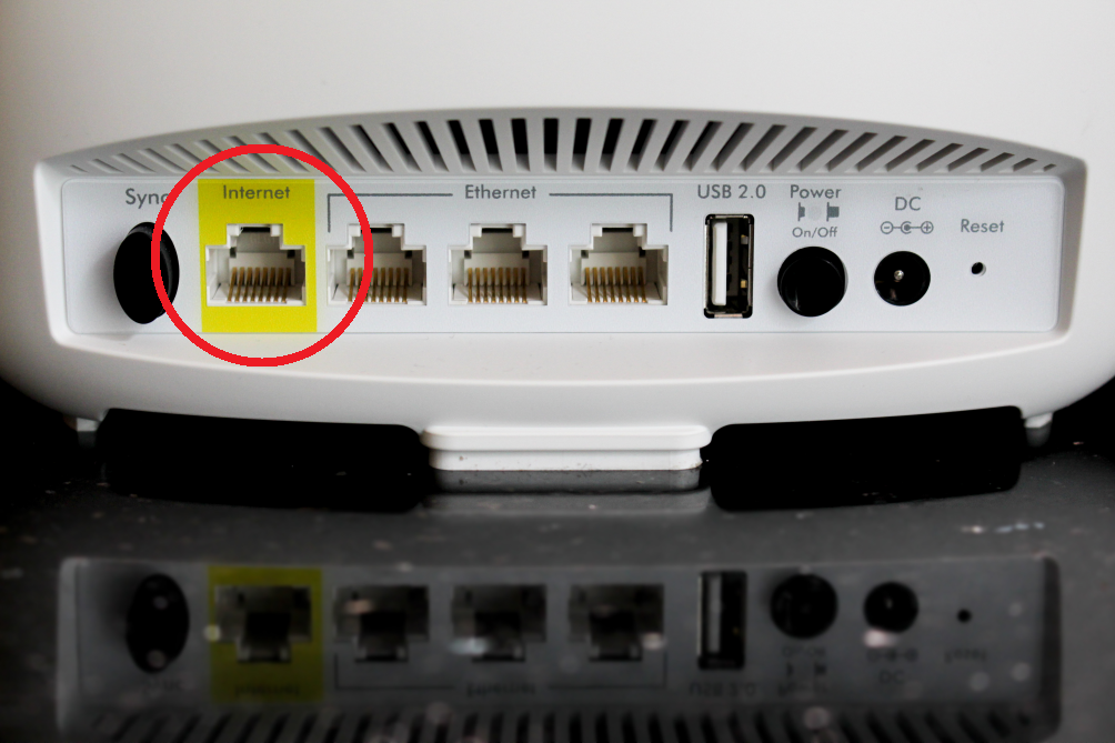 Router with the Internet port circled.