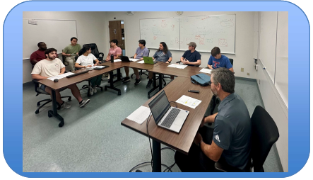 A picture of Chris Womack, Natalie Osborne, Aidan Schaubhut, Aiden Thomas, Bruhathi Kothapati, Carterious Burns, Dylan Ronquille, Frankie Lavall, Jacob Yee, Mark Masenda, Sujit Lopchan, Thomas Gordon, and Trey Harrelson